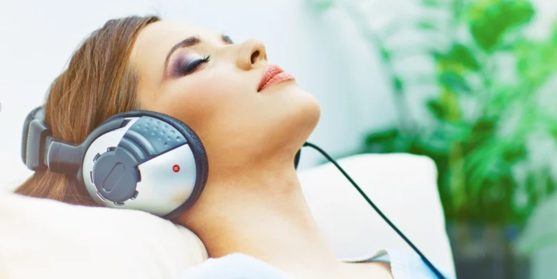 Person in a relaxed state during hypnotherapy for anxiety relief